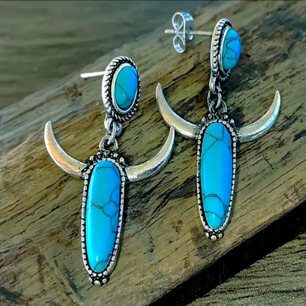 Silver plated horn earrings
